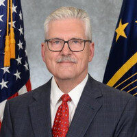 Dr. William “Bill” Luebke, SES